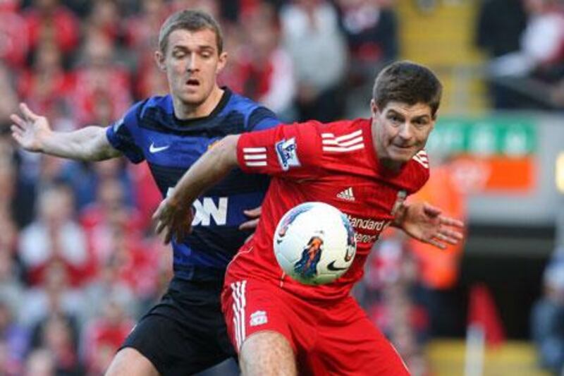 Steven Gerrard, right, scored against Manchester United on his first game for Liverpool since March 1.