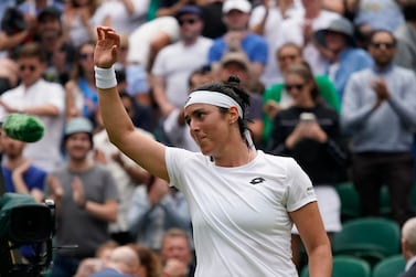 Tunisia's Ons Jabeur celebrates defeating France's Diane Parry in a third round women's singles match on day five of the Wimbledon tennis championships in London, Friday, July 1, 2022.  (AP Photo / Alberto Pezzali)