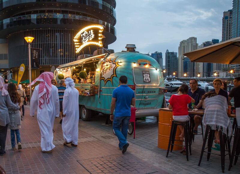 Dubai, U.A.E., March 17, 2017. Visitors check out the food trucks at the Dubai Marina Street Festival, Dubai Marina Mall.
Victor Besa for The National
ID: 47984
Reporter: 
National *** Local Caption ***  VB_031717_na-dxb marina street fest-13.jpg
