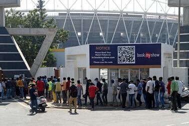 Cricket enthusiasts queue up to buy tickets outside the Sardar Patel stadium ahead of the third Test cricket match between India and England in Motera on the outskirts of Ahmadabad on February 20, 2021. IMAGE RESTRICTED TO EDITORIAL USE - STRICTLY NO COMMERCIAL USE / AFP / SAM PANTHAKY / IMAGE RESTRICTED TO EDITORIAL USE - STRICTLY NO COMMERCIAL USE