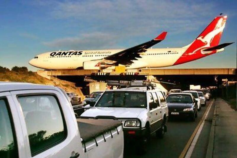 Qantas Airways, Australia's biggest airline, will announce its international business restructuring plan on August 24. Ian Waldie / Bloomberg News