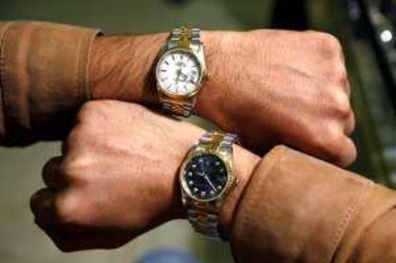 Abu Dhabi, UAE - January 15, 2008 - Fake Rolexes sold in the Hamdan Shopping Centre. (Nicole Hill / The National)  *** Local Caption ***  NH Rolex02.jpg