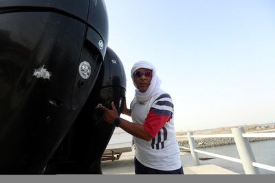 Fujairah, April 26, 2018: Yousef Baroun points out at the bullet shots fired by pirates during the interview at the fisherman port in Fujairah . Satish Kumar for the National / Story by Ruba Haza