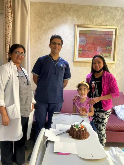 Althea Faye Barabacina and mother with Dr. Pinkesh Laxmikant Thakkar and Dr. Jamuna Raghuraman after recovery at Medeor Hospital Dubai. Courtesy Medeor Hospital 