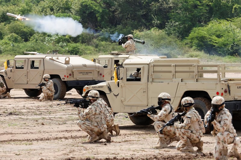 Colombian soldiers carry out military exercises, near the Buenavista Air Base, in La Guajira, Colombia. EPA