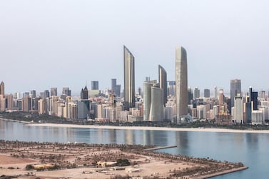 The Abu Dhabi skyline. It took the UAE only 50 years to transform desert fishing villages and Bedouin tribal settlements into a modern country. Mona Al Marzooqi for The National