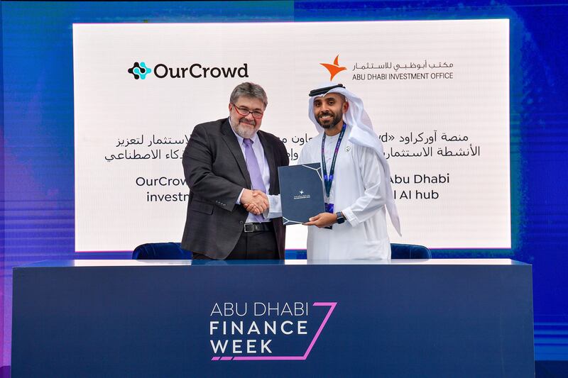 Adio is partnering with OurCrowd, Israel’s most active venture firm, to significantly expand its Abu Dhabi operations. Abdulla Abdul Aziz AlShamsi, acting director general of Adio, and Jon Medved, chief executive of OurCrowd, signed an agreement during Abu Dhabi Finance Week. Photo: Adio