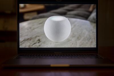 Apple HomePod mini speaker is unveiled during a virtual product launch seen on a laptop computer in Tiskilwa, Illinois, U.S., on Tuesday, Oct. 13, 2020. Apple Inc. revealed four redesigned iPhones with 5G wireless capability, upgraded cameras, faster processors and a wider range of screen sizes. Photographer: Daniel Acker/Bloomberg
