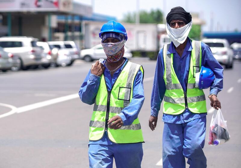 Abu Dhabi, United Arab Emirates, May 7, 2020. Workers with some goods from a baqala or convenience store at the Al Mina Vegetables and Fruits Market during the time of Ramadan and the Coronavirus pandemic.
Victor Besa/The National
Section:  NA
Reporter: