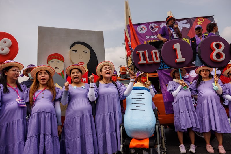 Members of Thai trade unions and women's networks march in Bangkok, calling for maternity and women workers' rights. Getty images
