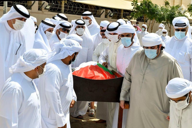 Hamdan bin Mohammed and Maktoum Bin Mohammed carry the body of the late Sheikh Hamdan bin Rashid Al Maktoum to his final resting place in Umm Hurair cemetery in Dubai. Dubai Media Office