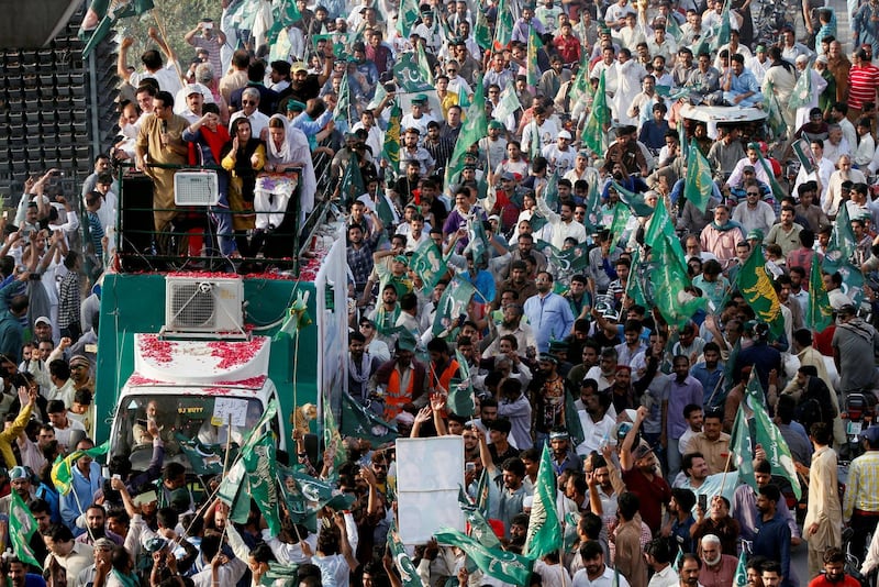 Supporters of the Pakistan Muslim League - Nawaz (PML-N) chant and march towards the airport to welcome ousted Prime Minister Nawaz Sharif and his daughter Maryam, in Lahore, Pakistan. Reuters