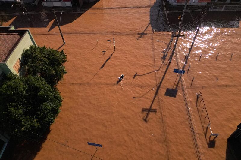 Flooded streets in the Sao Jao district of Porto Alegre, Brazil, where rescuers were searching for survivors. AFP