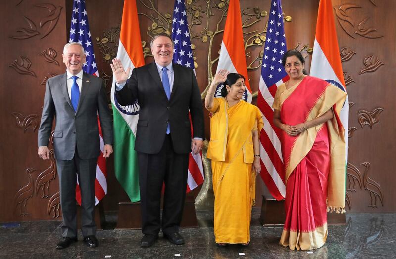 From left, U.S. Defense Secretary James Mattis, U.S. Secretary of State Mike Pompeo, Indian Foreign Minister Sushma Swaraj and Indian Defense Minister Nirmala Sitharaman stand for photographs before a meeting in New Delhi, India, Thursday, Sept. 6, 2018. Pompeo and Mattis are holding long-delayed talks Thursday with top Indian officials, looking to shore up the alliance with one of Washington's top regional allies. (AP Photo/Manish Swarup)