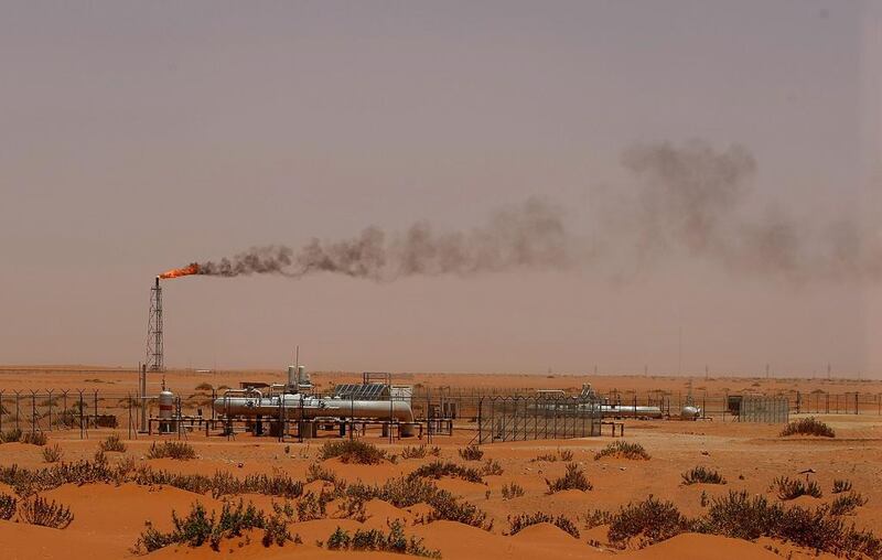 A flame from a Saudi Aramco oil installion. Saudi Arabia is set to keep production high despite the supply glut. AFP