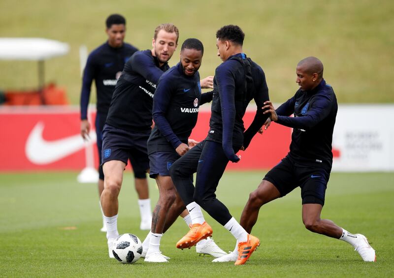 Harry Kane, Raheem Sterling, Jesse Lingard and Ashley Young in action during a training session at St Georges Park on May 28, 2018 in Burton-upon-Trent, England. Carl Recine / Reuters