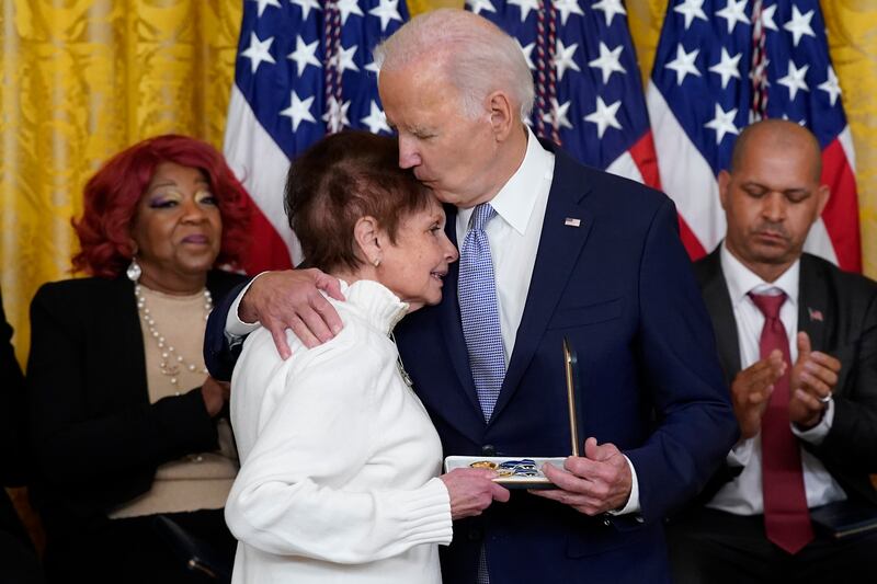 US President Joe Biden presents the Presidential Citizens Medal to Capitol Police Officer Brian Sicknick's mother during a ceremony to mark the second anniversary of the January 6 assault on the Capitol. AP