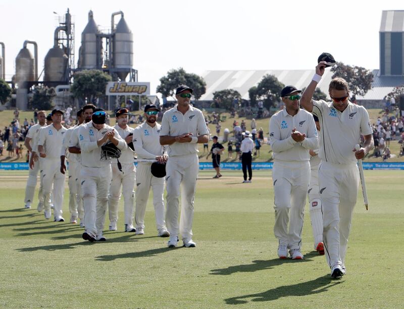 New Zealand's Neil Wagner, right, leads his victorious teammates from the field. AP