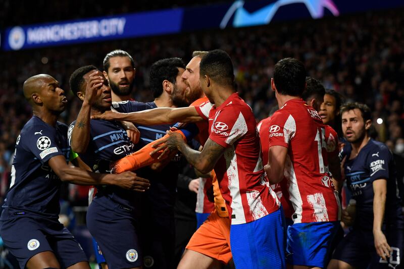 Players fight during the ill-tempered match. AFP