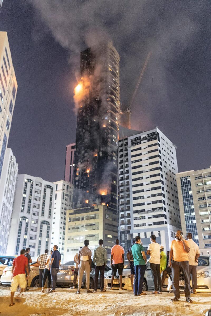 SHARJAH, UNITED ARAB EMIRATES. 05 MAY 2020. STANDALONE. Fire at the Abbco Tower near Nahda Park in Sharjah. Police and fire fighters responded to a blaze that was reported after 8:30. (Photo: Antonie Robertson/The National) Journalist: Salam Al Amir. Section: National.