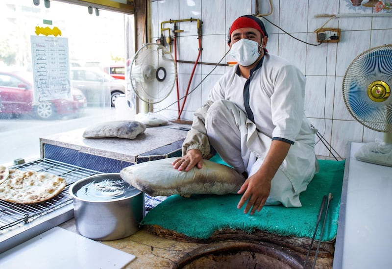 Abu Dhabi, United Arab Emirates, September 18, 2020.  Abdul Rahman has been working  at Naser Bader Bakery along Al Falah Street, Abu Dhabi for almost five years now.
Victor Besa /The National
Section:  NA/Standalone.