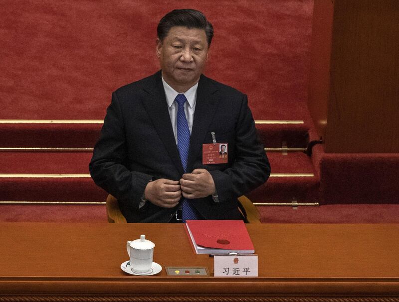 BEIJING, CHINA - MAY 28: Chinese president Xi Jinping listens during the closing session of the National People's Congress, which included a vote on a new draft security bill for Hong Kong, at the Great Hall of the People on May 28, 2020 in Beijing, China. The Chinese government passed the draft by a vote of 2,878 votes to one during the session. The draft law, which has drawn international concern, is set to address issues such as secession, subversion, terrorism, and foreign interference, comes after a year of anti-government protests in the semi-autonomous region. China held its annual parliamentary gathering, known as 'The Two Sessions', at the Great Hall of the People from May 21-28th after being postponed at the height of the coronavirus outbreak in China earlier this year. (Photo by Kevin Frayer/Getty Images)