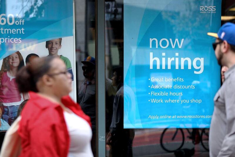 A 'now hiring' sign in San Francisco, California. Pandemic could help add more jobs as older people retire.  AFP