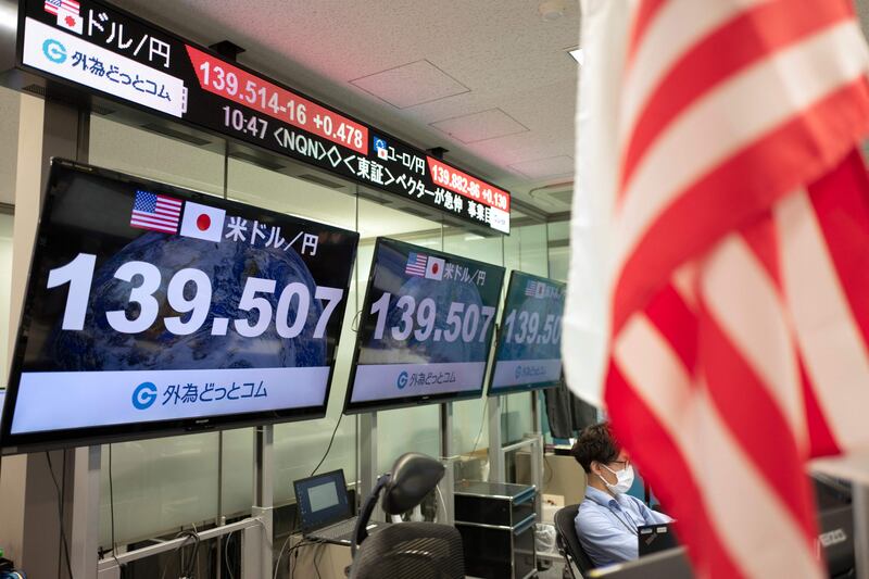 Electronic quotation boards display the yen's rate against the US dollar at a foreign exchange brokerage in Tokyo on September 1, 2022. AFP