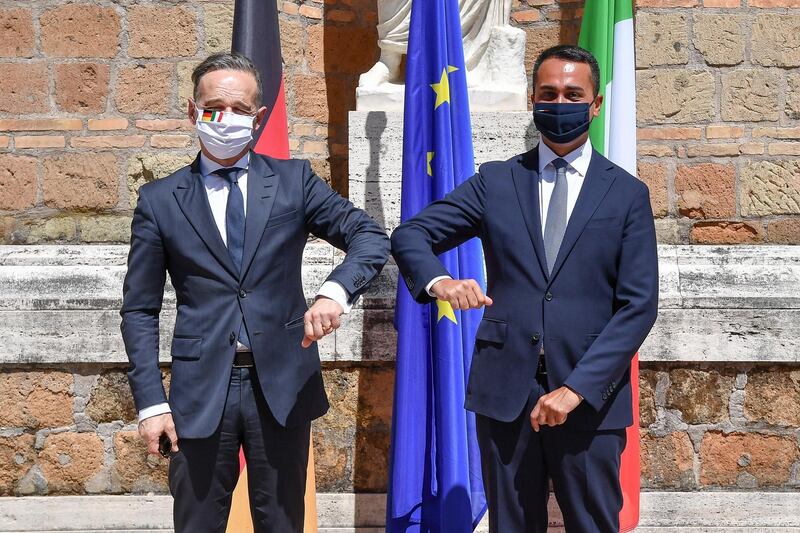 Italian Foreign Minister Luigi Di Maio (R) and German Foreign Minister Heiko Maas pose for photographers during a bilateral meeting at villa Madama, a sixteenth-century villa seat of representation by the Prime Minister and the Ministry of Foreign Affairs of the Italian Republic, Rome, Italy.  EPA