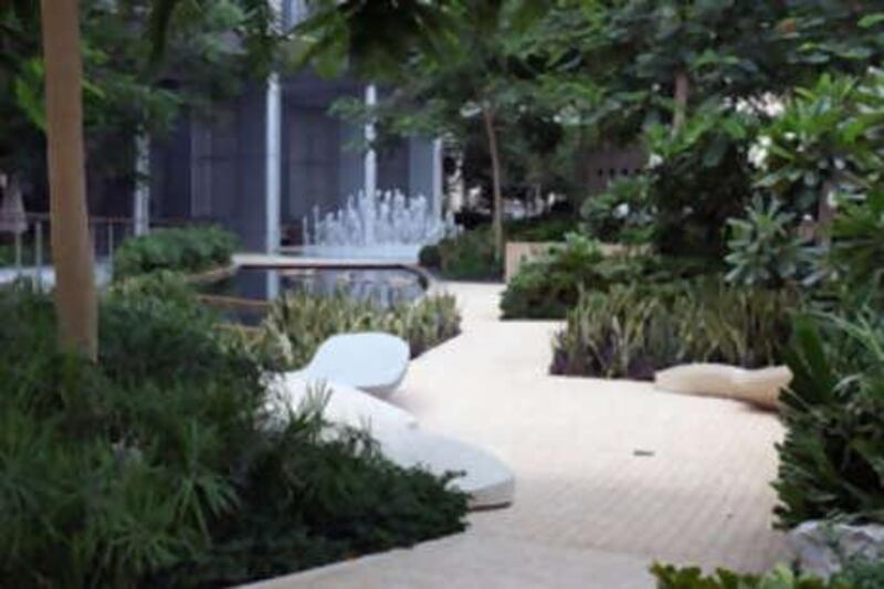 DUBAI, UNITED ARAB EMIRATES - JUNE 13:  View of the outdoor garden area at The Address hotel in the Downtown Burj area of Dubai on June 13, 2010.  (Randi Sokoloff / The National)  For House&Home-Gardening