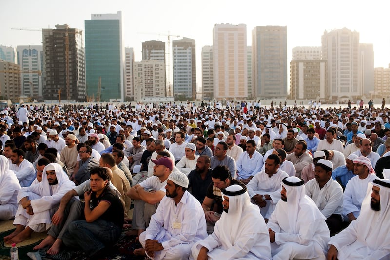 20/09/2009 - Abu Dhabi, UAE - Muslims pray during Eid al Fitr at Al Eid Mosque in Abu Dhabi on Sunday September 20, 2009.  (Andrew Henderson/The National) *** Local Caption ***  ah_090920_Eid_0043.jpg
