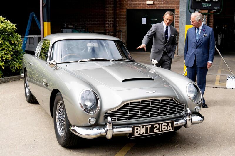 (FILES) In this file photo taken on June 20, 2019 Britain's Prince Charles (R), Prince of Wales meets British actor Daniel Craig as he tours the set of the 25th James Bond Film at Pinewood Studios in Iver Heath, west of London. Far from being wiped out by the coronavirus pandemic, Britain's film and television industry is enjoying a blockbuster run thanks in large part to a surge in online streaming. Attracting global production teams to spectacular landscapes, gothic castles and state-of-the-art studios in the UK, the nation's film industry has enjoyed big growth in recent years -- also thanks to tax breaks. 
 / AFP / POOL / Niklas HALLE'N
