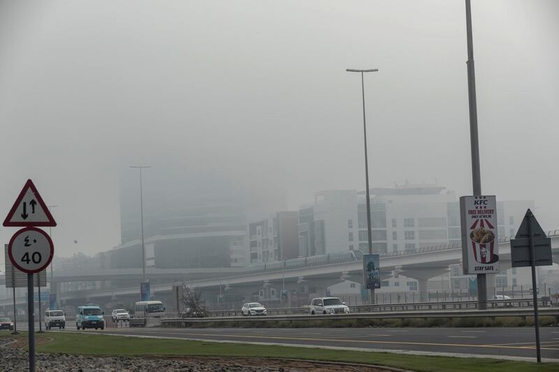 DUBAI, UNITED ARAB EMIRATES. 02 APRIL 2020. Weather picture during the time of the COVID-19 Stay At Home campaign in Dubai. Heavy fog envelops Sheikh Zayed road in Al Barsha. (Photo: Antonie Robertson/The National) Journalist: Standalone. Section: National.