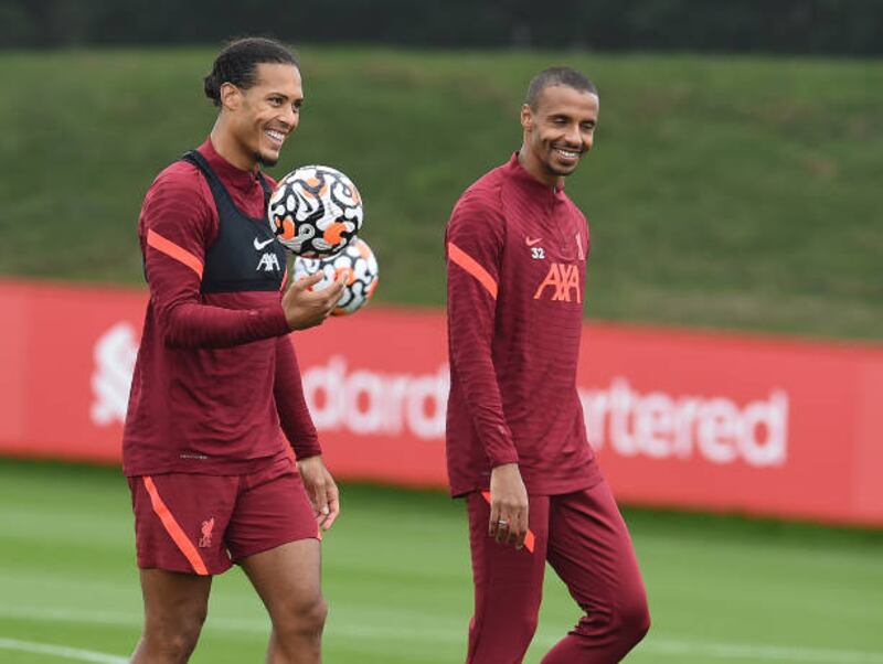 Virgil van Dijk and Joel Matip during Liverpool's training session at AXA Training Centre.