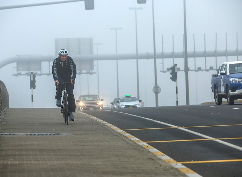 Abu Dhabi, U.A.E., January 16, 2018.  Early morning fog at the Khalifa-Masdar bridge area.
Victor Besa / The National
National