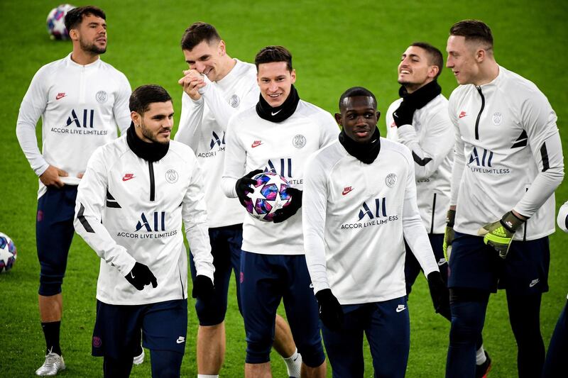 PSG's Julian Draxler (C) and his teammates attend a training session in Dortmund, Germany. EPA