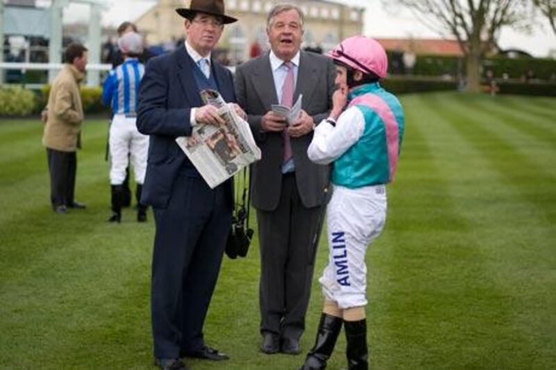 Lord Grimthorpe, left, with Michael Stoute and jockey Ryan Moore at Newmarket, will be in York today to watch Twice Over compete in the Group 1 International.