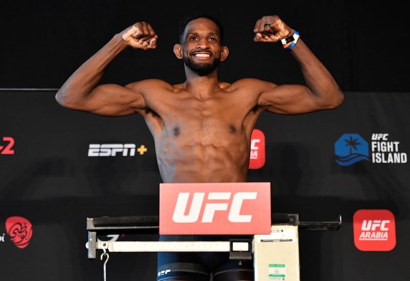 ABU DHABI, UNITED ARAB EMIRATES - JANUARY 19: Neil Magny poses on the scale during the UFC weigh-in at Etihad Arena on UFC Fight Island on January 19, 2021 in Abu Dhabi, United Arab Emirates. (Photo by Jeff Bottari/Zuffa LLC) *** Local Caption *** ABU DHABI, UNITED ARAB EMIRATES - JANUARY 19: Neil Magny poses on the scale during the UFC weigh-in at Etihad Arena on UFC Fight Island on January 19, 2021 in Abu Dhabi, United Arab Emirates. (Photo by Jeff Bottari/Zuffa LLC)