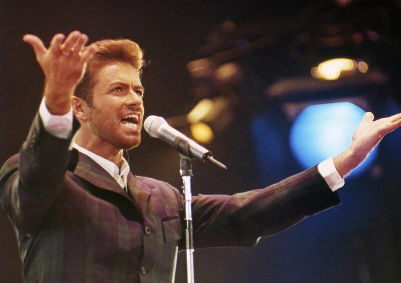 George Michael performs at Concert of Hope to mark World Aids Day, at London’s Wembley Arena on December 2, 1993. AP photo