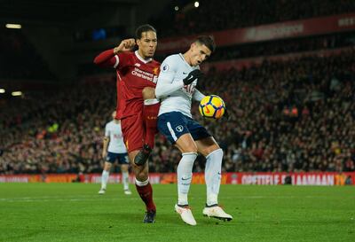 epa06496617 Tottenham Hotspur’s Erik Lamela (R) is tackled in the penalty area by Liverpool’s Virgil van Dijk (L) during the English Premier League soccer match between Liverpool and Tottenham Hotspur in Liverpool, Britain, 04 February 2018.  EPA/PETER POWELL EDITORIAL USE ONLY. No use with unauthorized audio, video, data, fixture lists, club/league logos or 'live' services. Online in-match use limited to 75 images, no video emulation. No use in betting, games or single club/league/player publications EPA/PETE
