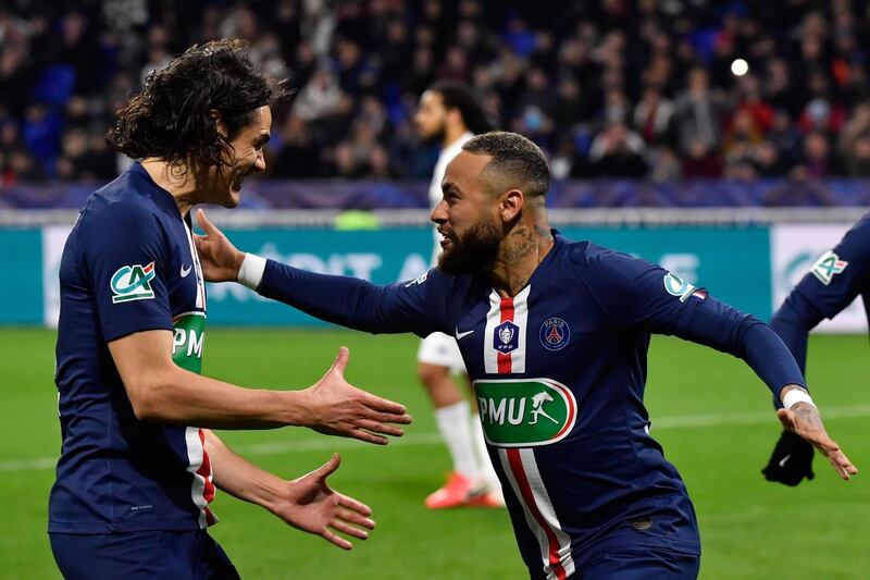 Neymar celebrates with Edinson Cavani. AFP