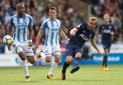 Soccer Football - Premier League - Huddersfield Town vs Tottenham Hotspur - John Smith's Stadium, Huddersfield, Britain - September 30, 2017   Tottenham's Harry Kane scores their third goal    Action Images via Reuters/Carl Recine  EDITORIAL USE ONLY. No use with unauthorized audio, video, data, fixture lists, club/league logos or "live" services. Online in-match use limited to 75 images, no video emulation. No use in betting, games or single club/league/player publications. Please contact your account representative for further details.