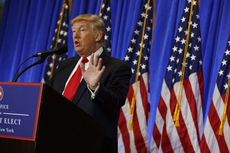 President-elect Donald Trump speaks during a news conference in the lobby of Trump Tower in New York on January 11, 2017. Evan Vucci/AP Photo