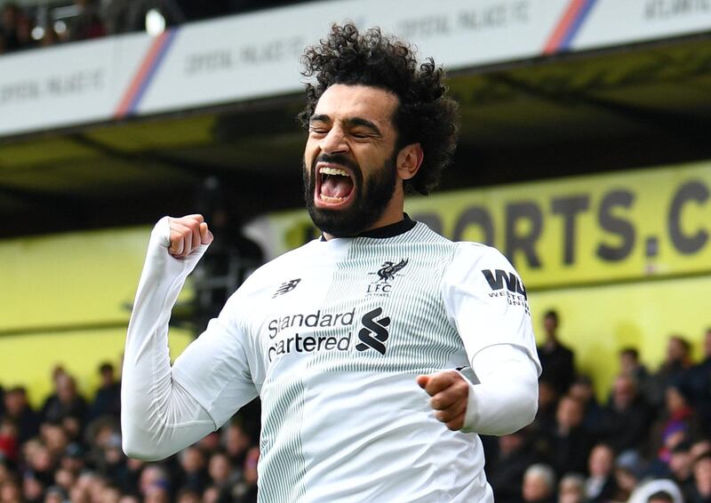 Soccer Football - Premier League - Crystal Palace vs Liverpool - Selhurst Park, London, Britain - March 31, 2018   Liverpool's Mohamed Salah celebrates scoring their second goal    REUTERS/Dylan Martinez    EDITORIAL USE ONLY. No use with unauthorized audio, video, data, fixture lists, club/league logos or "live" services. Online in-match use limited to 75 images, no video emulation. No use in betting, games or single club/league/player publications.  Please contact your account representative for further details.