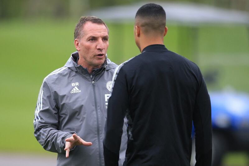 Leicester manager Brendan Rodgers speaks to Youri Tielemans at training. AFP