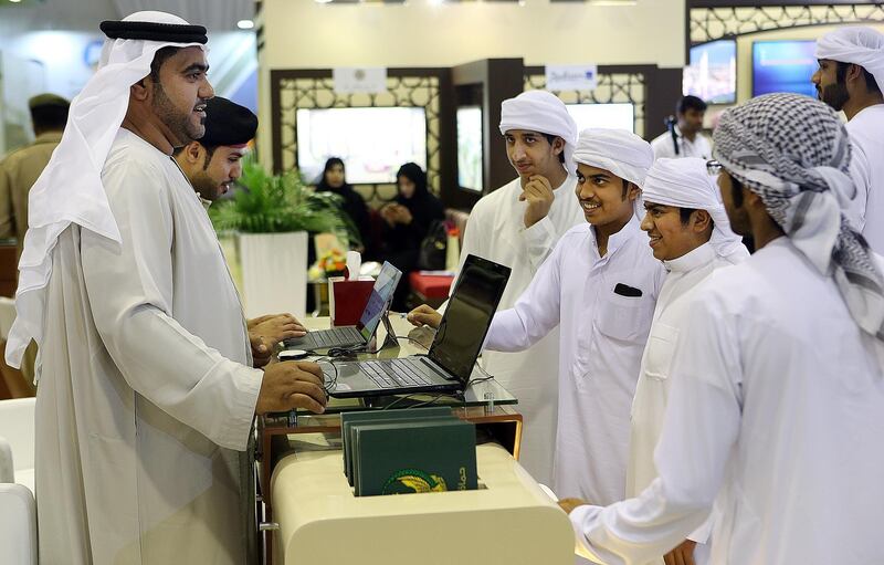 Fujairah, 25, April, 2017: Emiratis apply for the job at the Etisalat  during the  Fujairah International Career and Education Fair 2017 at the Exhibition Centre in Fujairah.  ( Satish Kumar / The National ) 
ID No: 30569
Section: News
Reporter: Ruba Haza