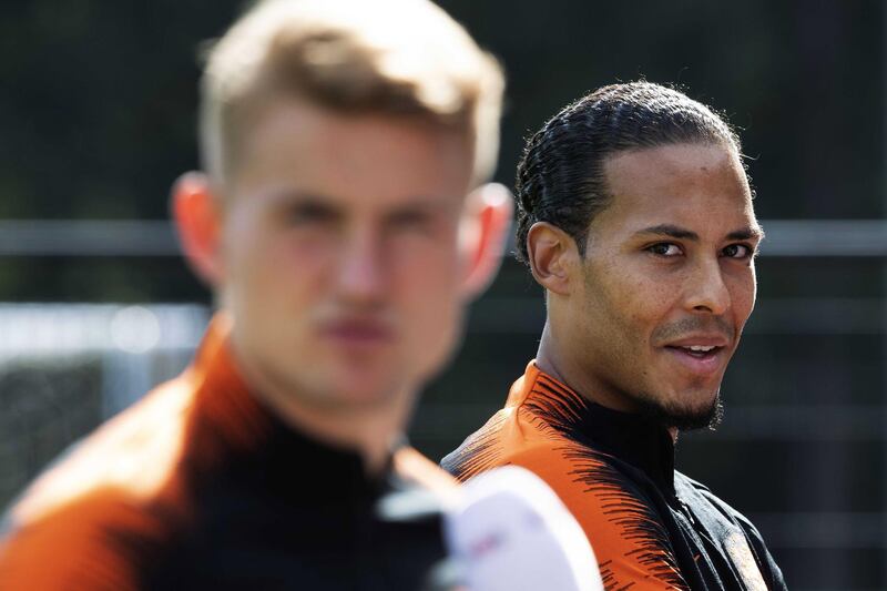 epa07813354 Players Matthijs de Ligt (L) and Virgil van Dijk (R) attend a training session of the Dutch national soccer team in Zeist, The Netherlands, 02 September 2019. The Netherlands will play against Germany in the UEFA EURO 2020 qualiciation match on 06 September 2019.  EPA/OLAF KRAAK