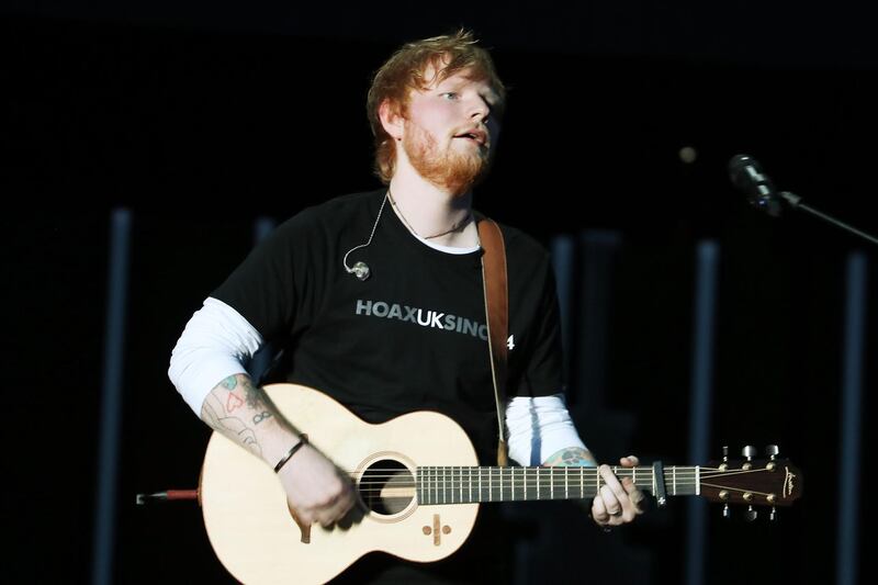 JOHANNESBURG, SOUTH AFRICA - DECEMBER 02:  Ed Sheeran performs during the Global Citizen Festival: Mandela 100 at FNB Stadium on December 2, 2018 in Johannesburg, South Africa.  (Photo by Jemal Countess/Getty Images for Global Citizen Festival: Mandela 100)