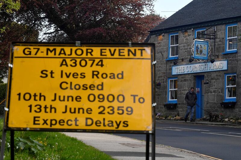 FILE PHOTO: A temporary road closure warning sign is seen near the Carbis Bay hotel resort, where an in-person G7 summit of global leaders is due to take place in June, St Ives, Cornwall, southwest Britain May 24, 2021. REUTERS/Toby Melville/File Photo