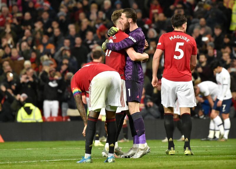 Manchester United's players celebrate afterbeating Tottenham. AP Photo